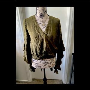 Woman’s khaki bell sleeve blouse